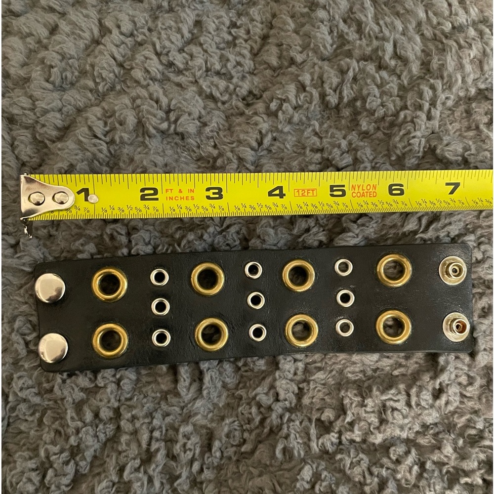 Melamed Leather grommet bracket